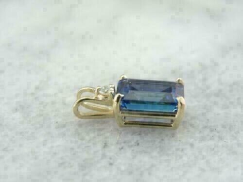 2Ct Emerald Cut Blue Sapphire Women’s Solitaire Pendant 14K Yellow Gold Finish