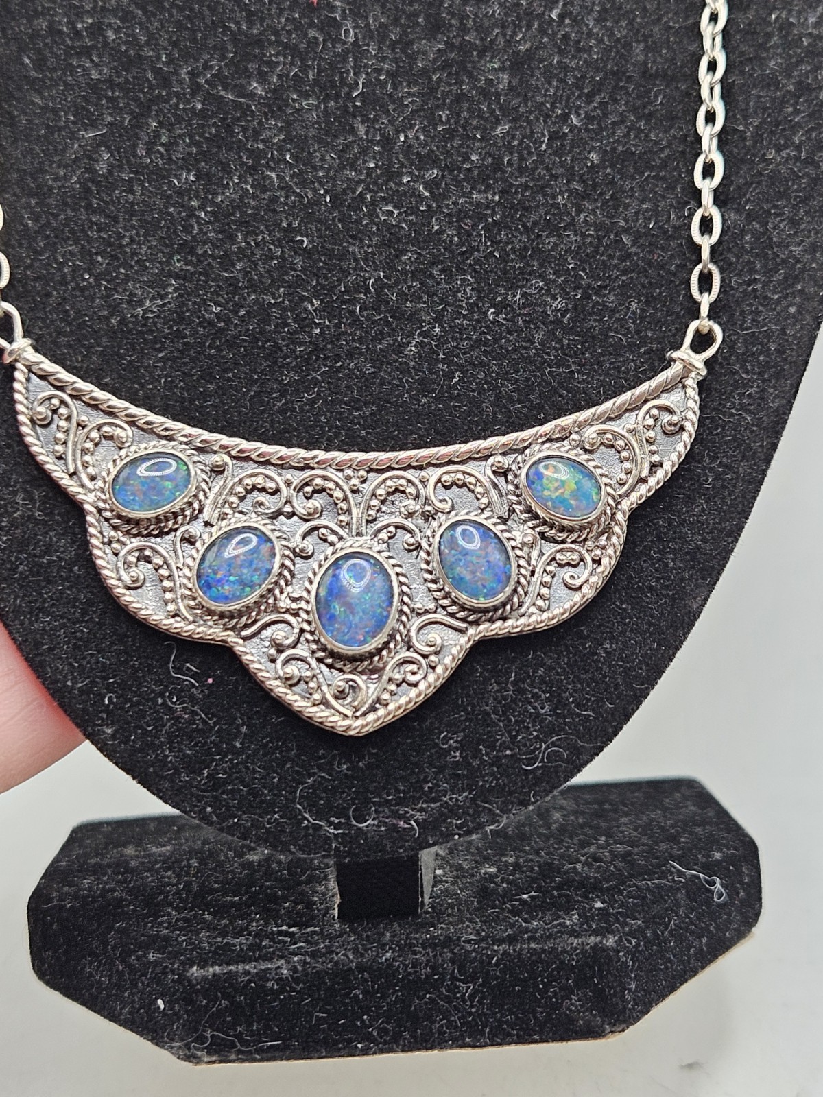 Sterling Silver Bib Style Necklace With 5 Oval Bezel Set Opals. 20″ Marked. 925.