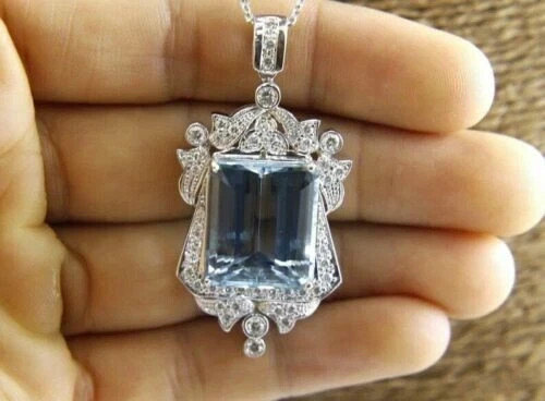 4Ct Emerald Cut Blue Topaz Halo Women’s Pendant 14K White Gold Finish Free Chain