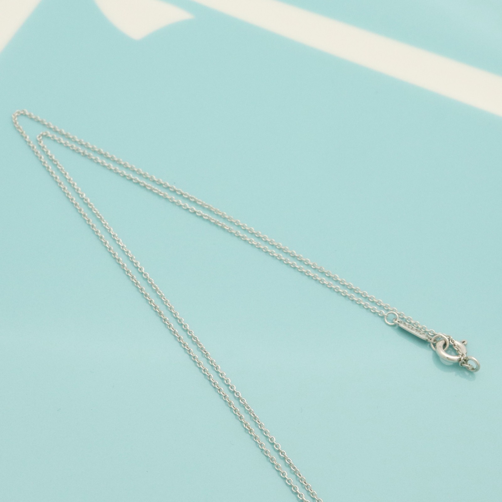 Tiffany & Co. Letter K Notes Alphabet Initial Disc Necklace 16.2″ Silver 925