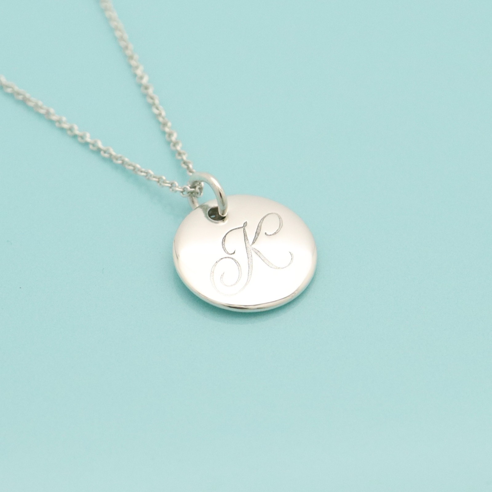 Tiffany & Co. Letter K Notes Alphabet Initial Disc Necklace 16.2″ Silver 925