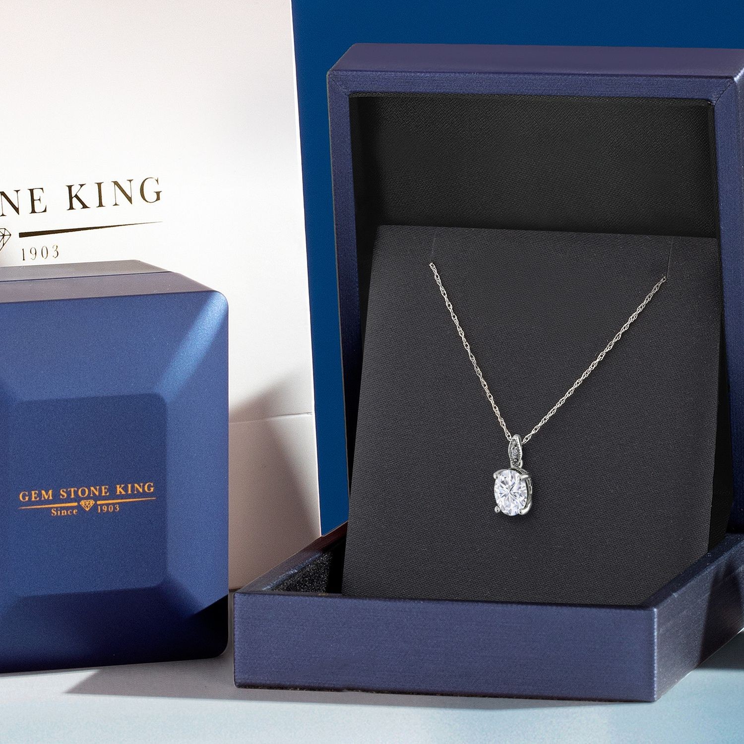 10K White Gold Pendant Near Colorless Oval Moissanite and Diamond