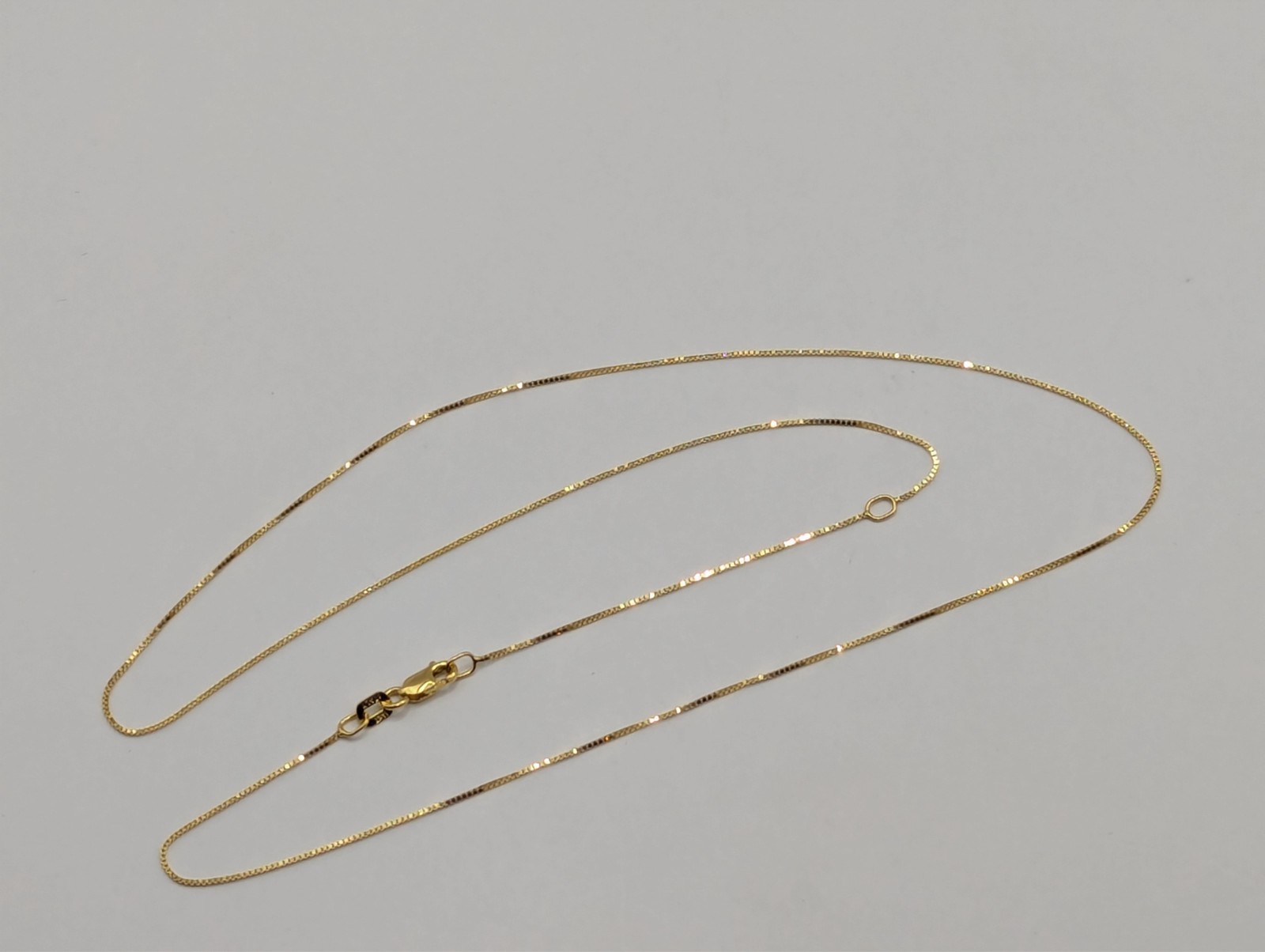 14k Adjustable box chain 16-18″ .6mm with lobster Milor brandclasp