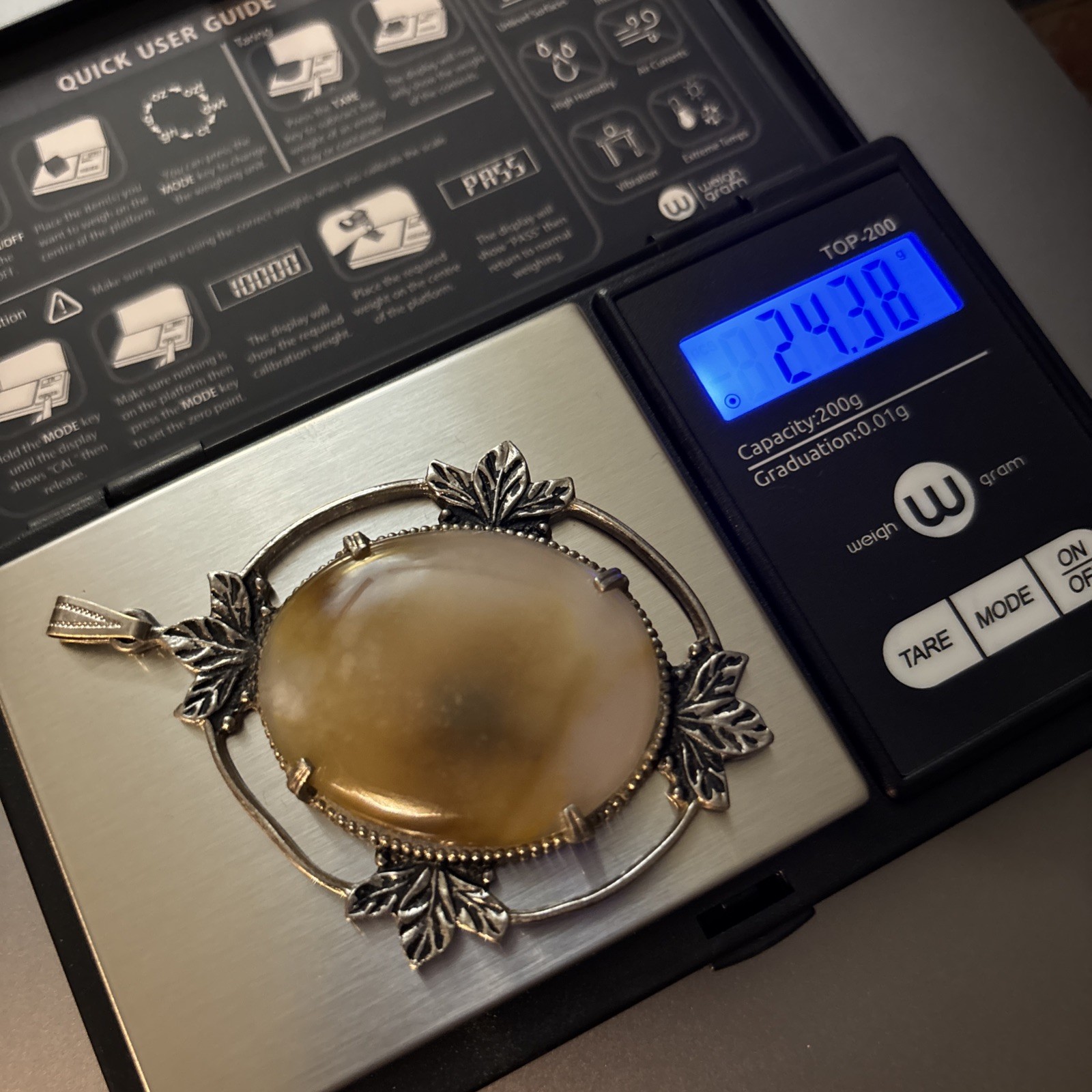 Large Oval-Shaped Cabochon Agate Set In A Silver-Tone Metal Frame