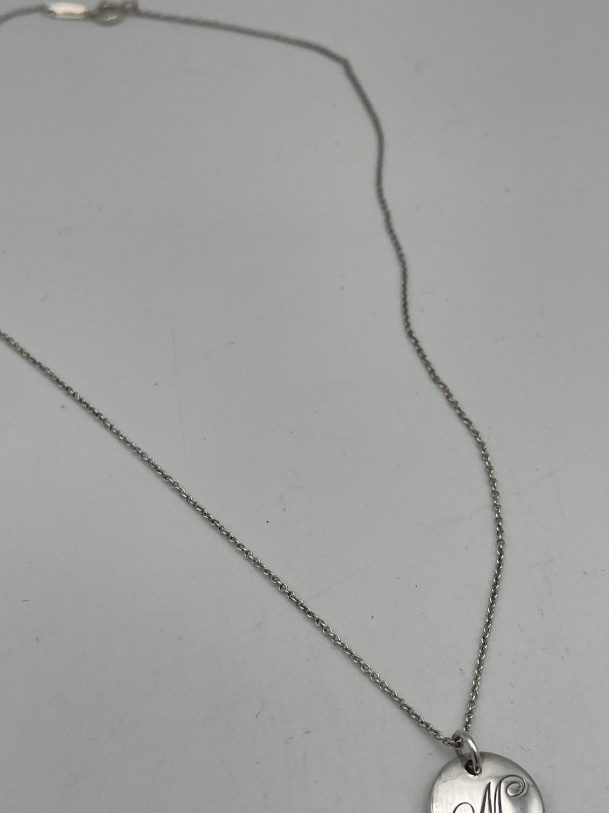 Tiffany & Co. Notes Initial Letter M Disc Pendant Necklace Sterling Silver 16″
