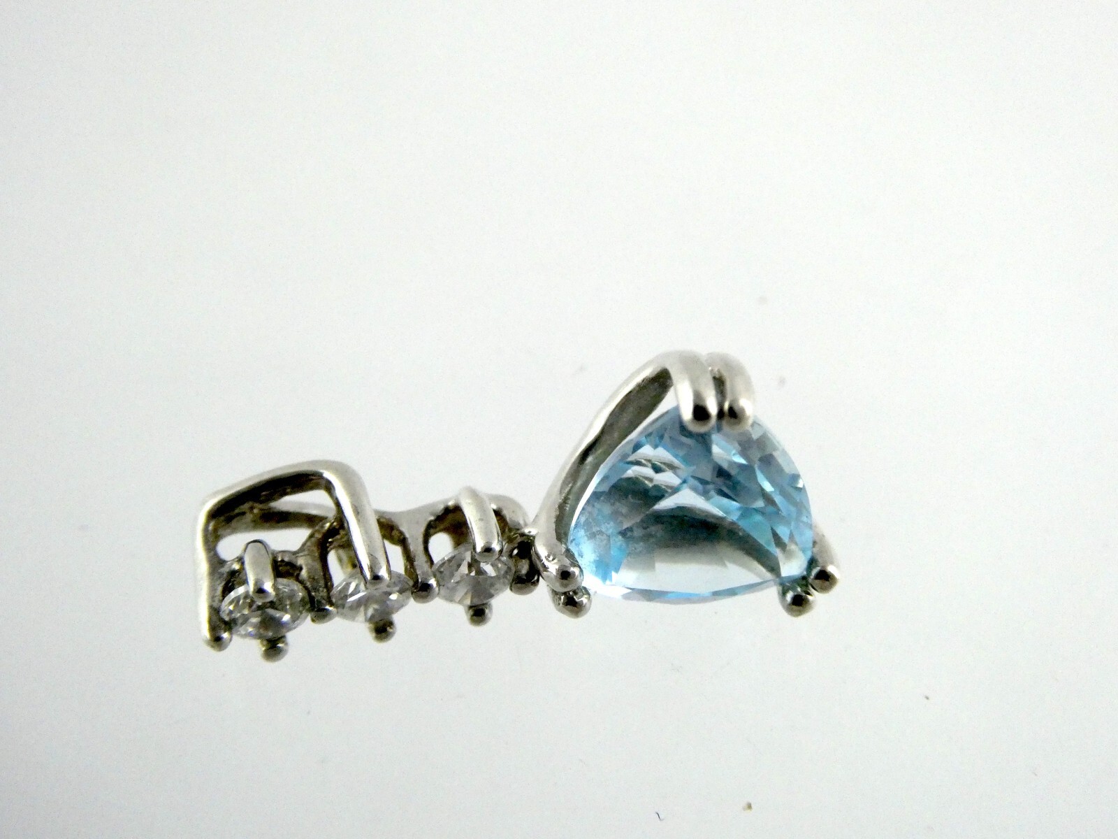 Sterling Silver Blue Topaz White CZ Pendant Trillion and Round Cuts 925 .75 Inch