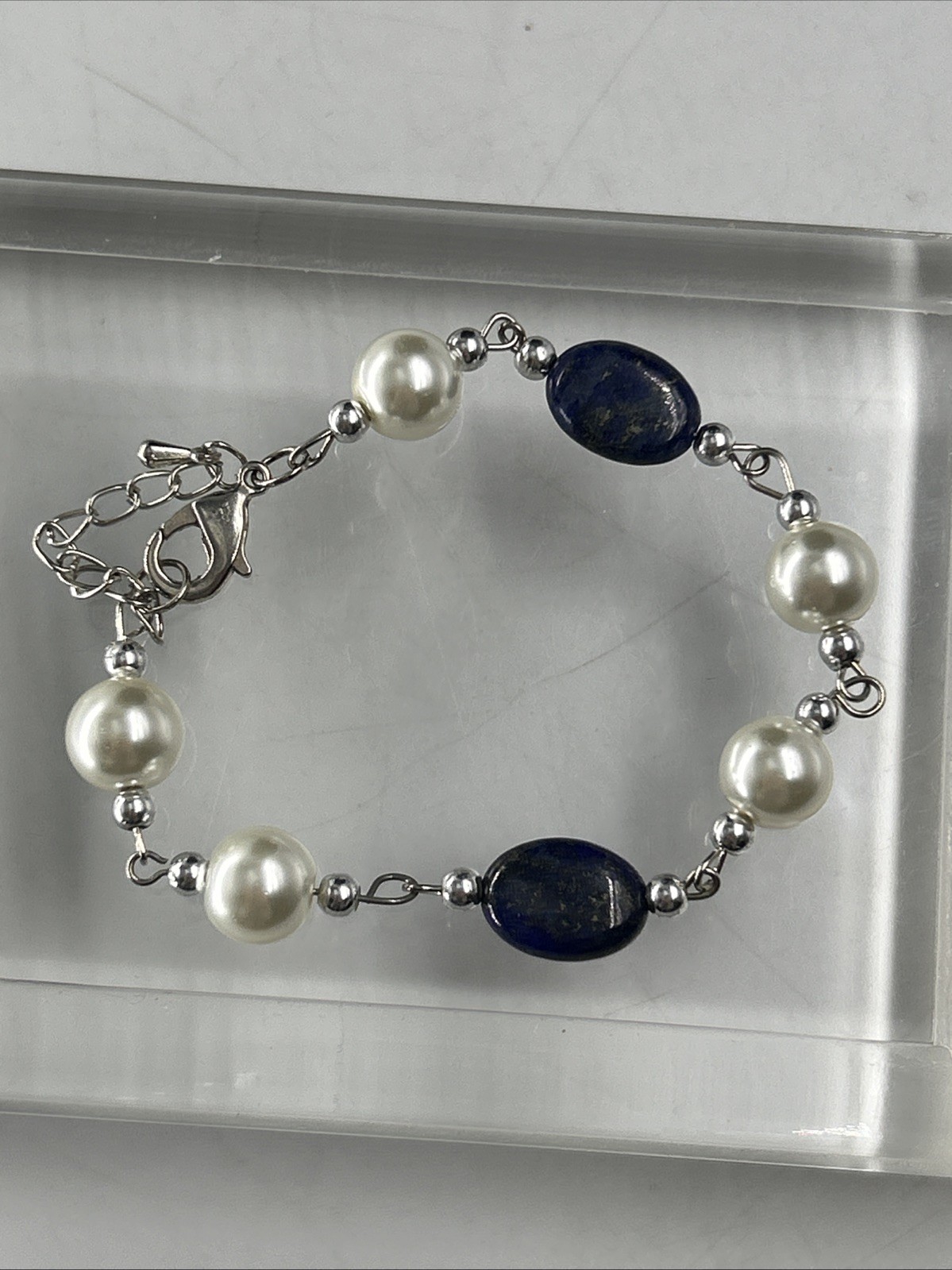beautiful Fashion necklace with faux pearl and blue stones And Bracelet