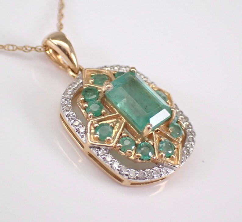 2.2Ct Emerald Cut Lab Created Emerald Halo Pendant 14K Yellow Gold Plated Silver