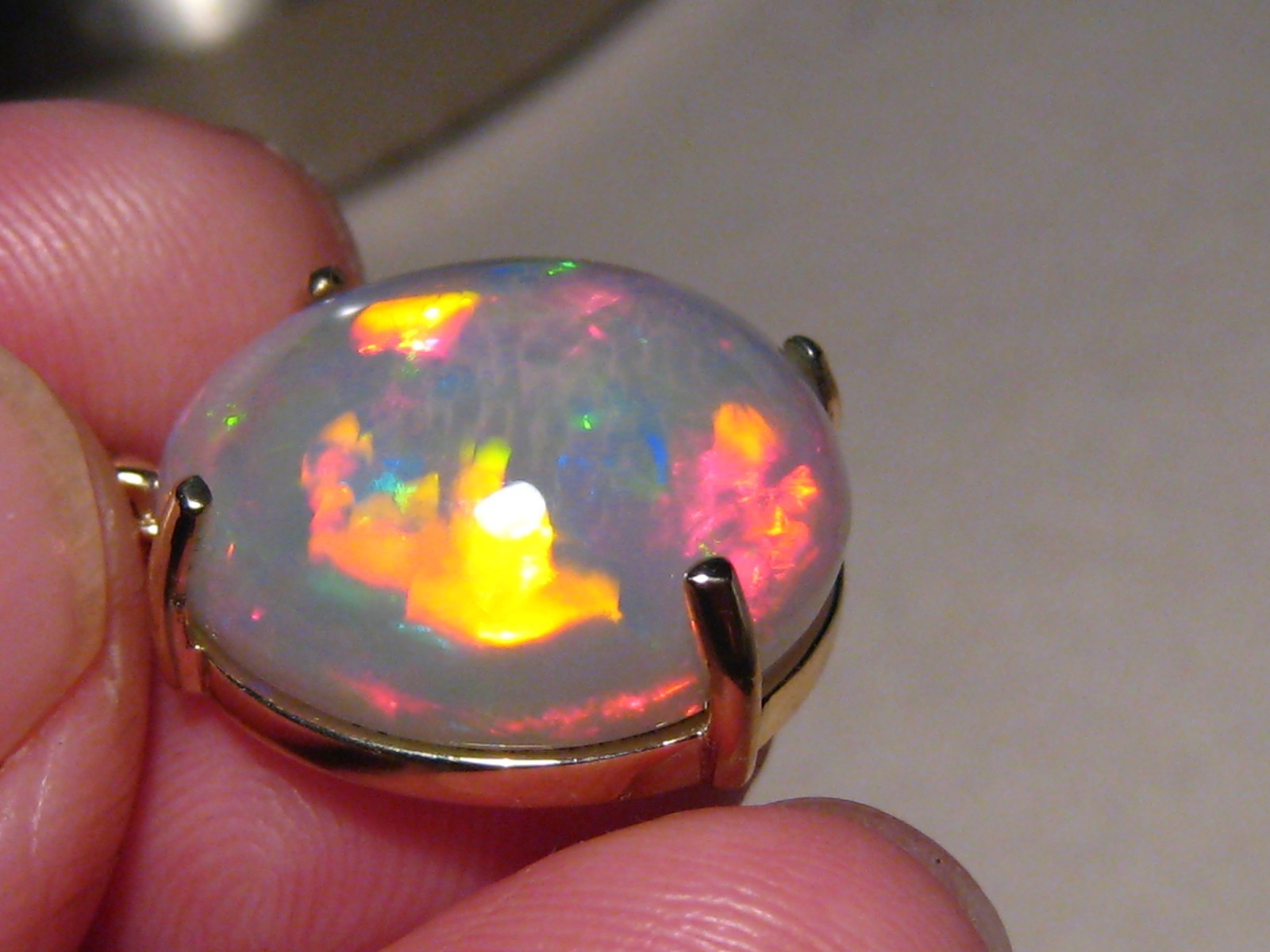 Large 16 ct. Ethiopian Opal and Diamond Pendant , 14 k Gold , Red Harlequin