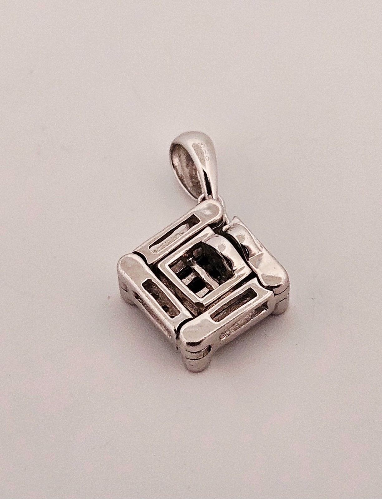Sterling silver convertible genuine black & white diamond pendant
