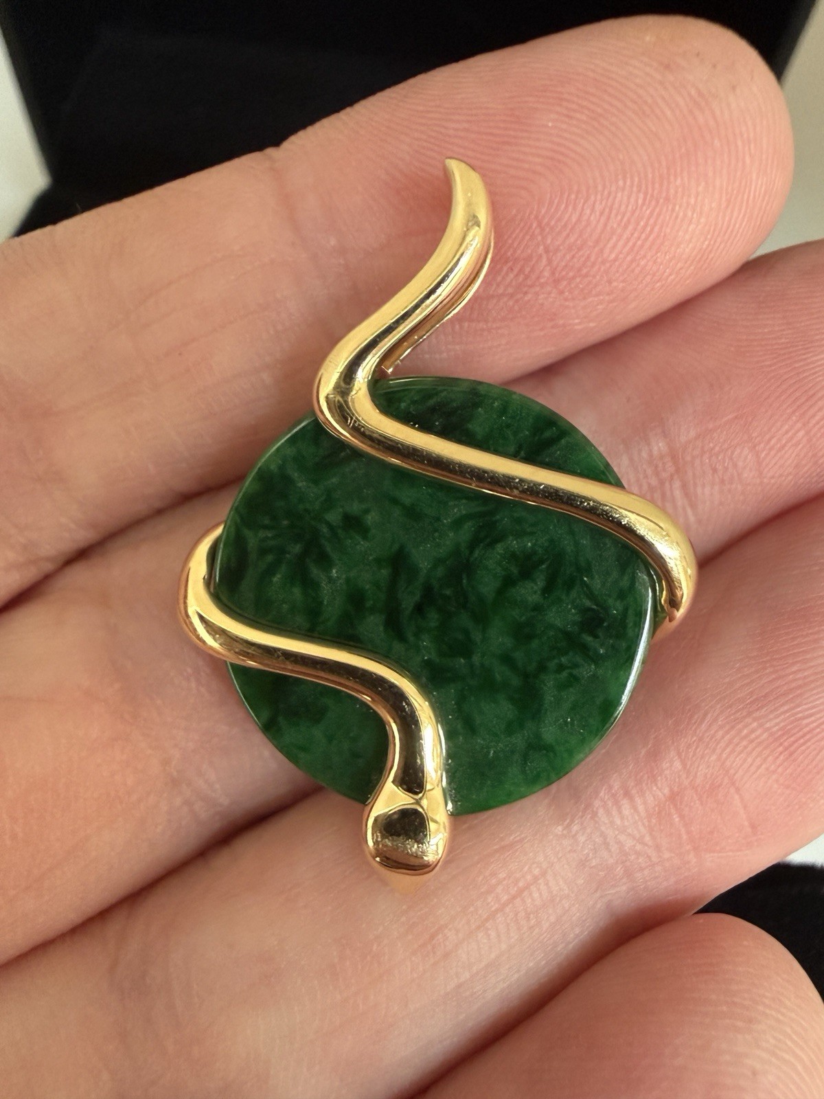 Natural Type A jadeite pendant with an 18K gold serpent wrap – from Kathy Jade