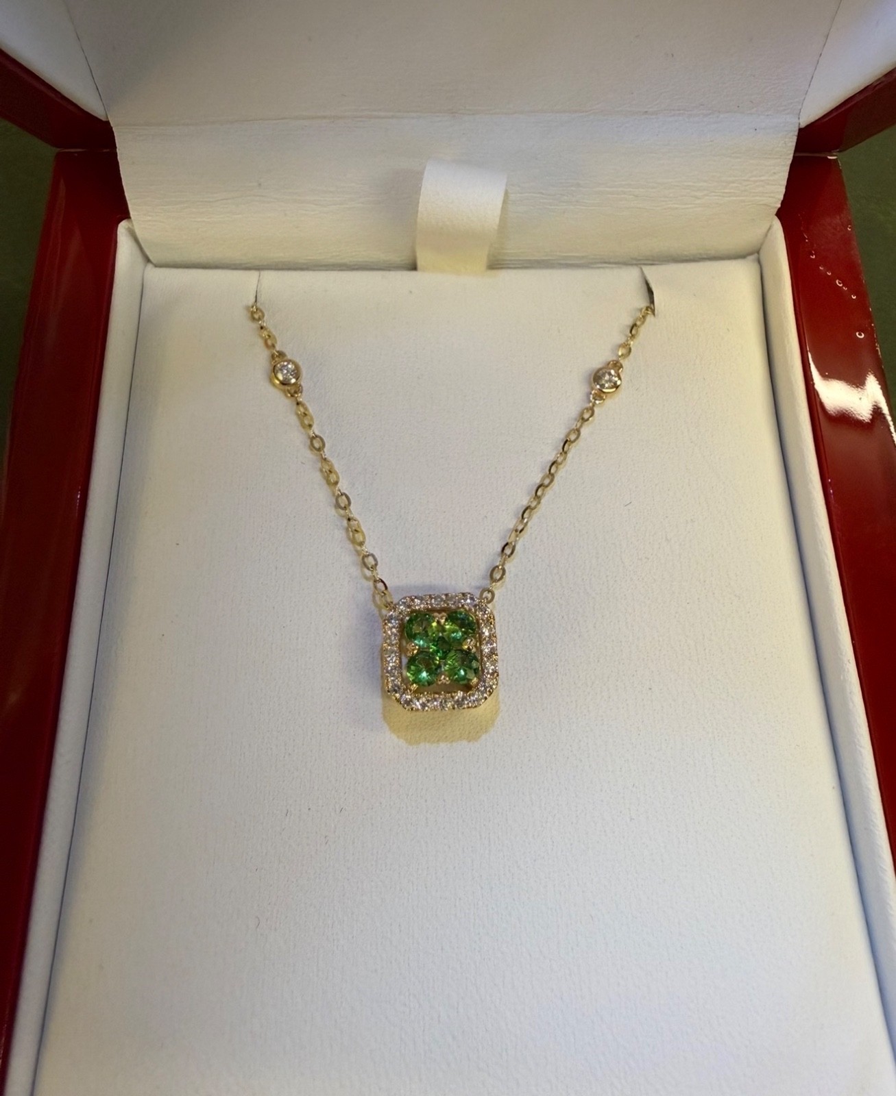 Tsavorite Garnet and Diamond Pendant 14 kt yellow gold 18 in chain